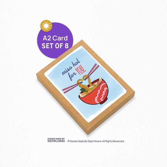 4.25 x 5.5” A2 size card illustration of a red and pink ramen bowl with scallions, seaweed, egg, and noodles. Two sets of pink chopsticks hold the noodles, creating the shape of a heart. The text reads, "Miso Hot For You". Blank inside. Black Woman Owned.