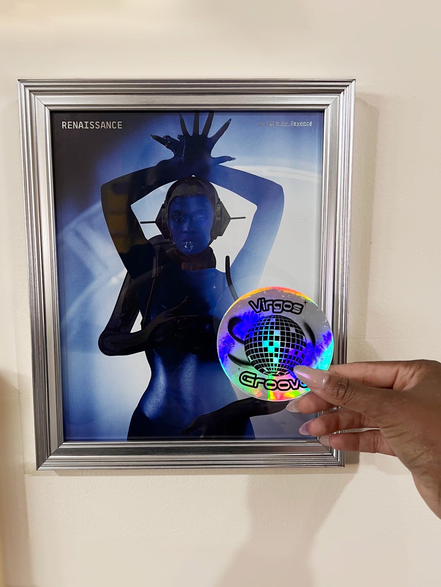 3 x 3” holographic waterproof sticker with a disco ball and the words ‘Virgo’s Groove’. A bee floats around the disco ball symbolizing Beyoncé’s bey-hive.High quality vinyl waterproof and scratch resistant sticker from Goods Made By Digitrillnana. Perfect for laptops, water bottles, phone cases, luggage, journals, and more! Black Woman Owned.