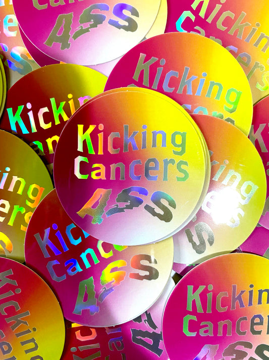 Kicking Cancers Ass holographic high quality vinyl waterproof and scratch resistant sticker from Goods Made By Digitrillnana. Perfect for laptops, water bottles, phone cases, luggage, journals, and more! Black Woman Owned.