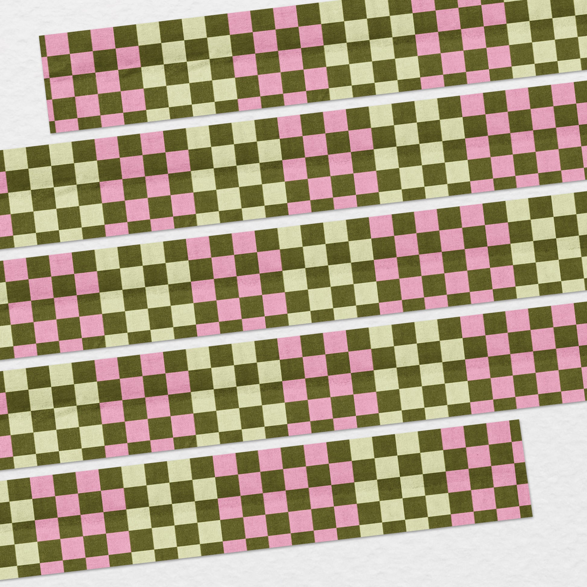 15mm checkered washi tape roll with a bold pink and green geometric pattern. Re-adjustable and removable. Perfect for your planner, junk journal, and scrapbook.