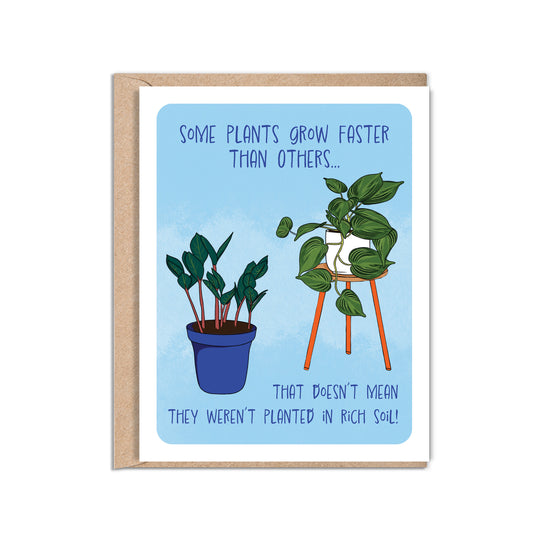4.25 x 5.5” A2 size card colorful illustration of a ZZ plant and pothos plant with a light blue background. The encouragement card reads ‘Some plants grow faster than others…that doesn’t mean they weren’t planted in rich soil!’. Envelope included. Black Woman Owned.