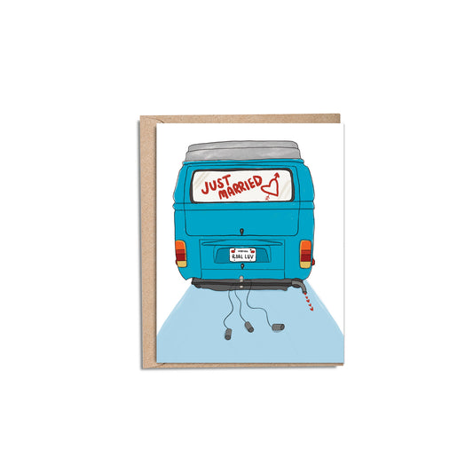 4.25 x 5.5” A2 size card with an illustration of the back of a vintage teal blue van with the words “Just Married” on the back window with a heart and arrow. The license plate reads “Real Luv” with cans tied to the bumper floating behind and little hearts coming out of the exhaust pipe. The inside of the card is blank. Envelope included. Black Woman Owned.
