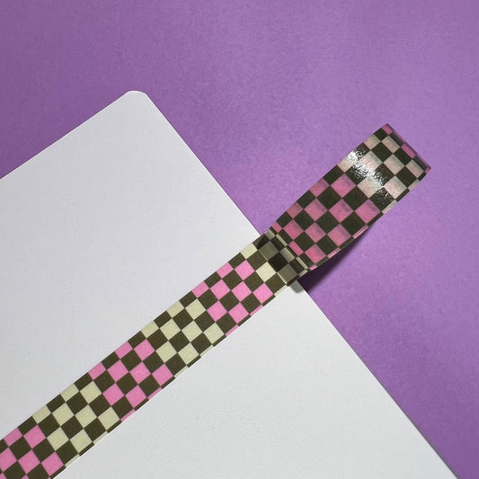 15mm checkered washi tape roll with a bold pink and green geometric pattern. Re-adjustable and removable. Perfect for your planner, junk journal, and scrapbook.