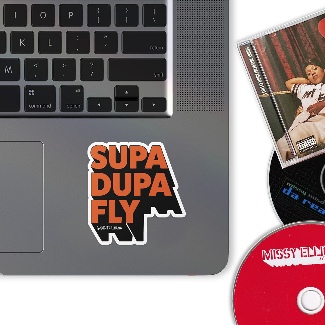 2 x 2” 3D sticker with the words Supa Dupa Fly in the color burnt orange with a black stroke and black 3D shadow. Kiss cut high quality vinyl waterproof stickers for laptops, water bottles, luggage, journals, and more!